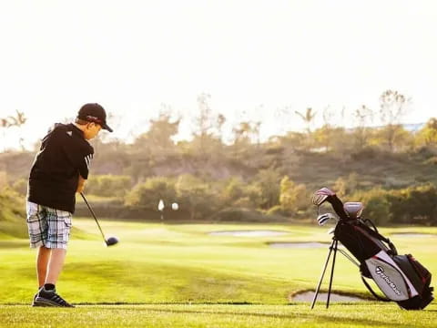 a person playing golf