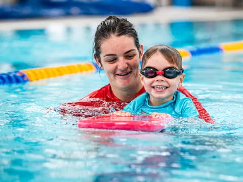 a man and a woman in a pool