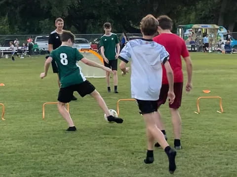 a group of men playing football