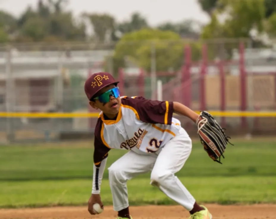 a baseball player catching a ball