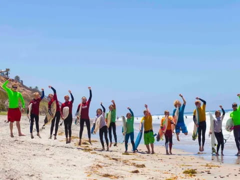 a group of people on a beach