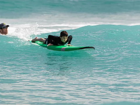 a man and a woman surfing