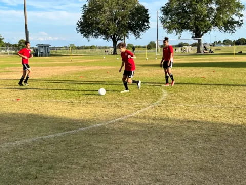 a group of people play football