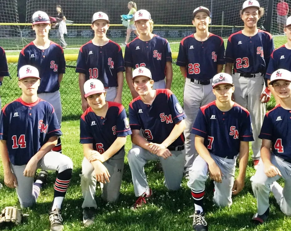 a group of kids posing for a photo
