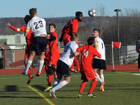 a group of men playing football
