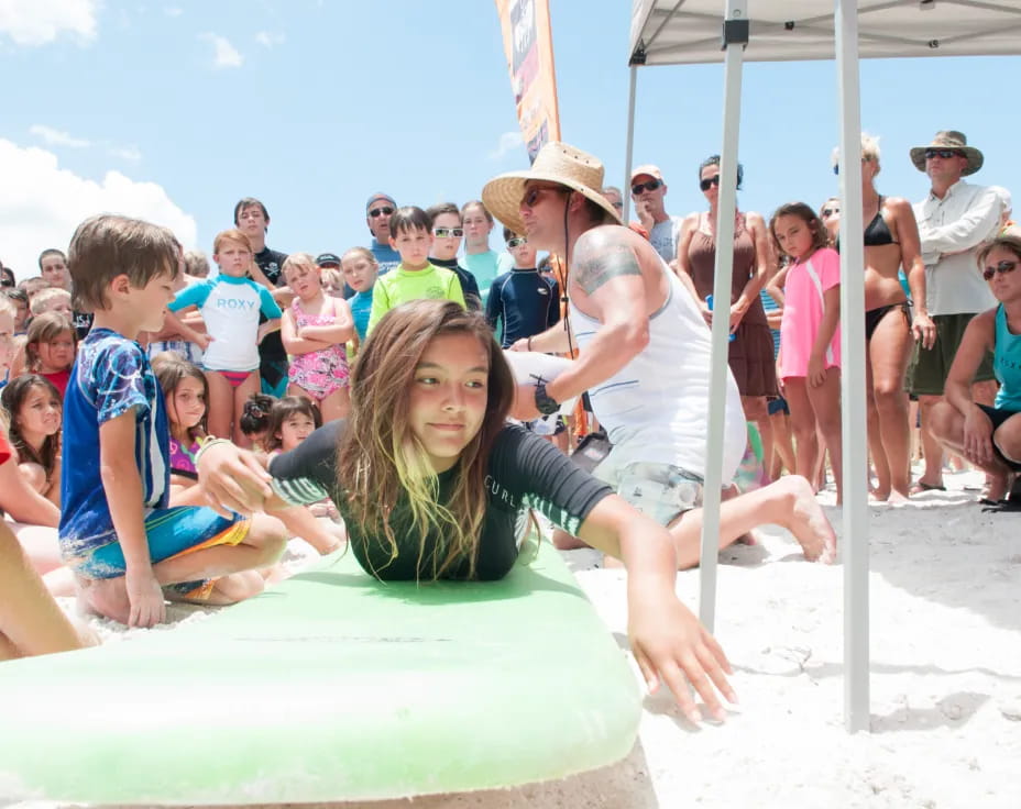 a group of people on a beach