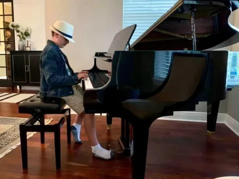 a person playing a piano