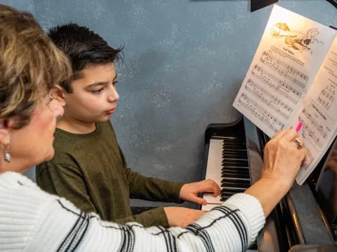 a man writing on a paper