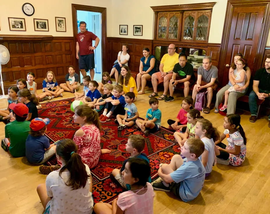a group of people sitting in a room