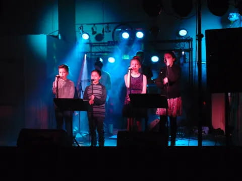 a group of people on a stage