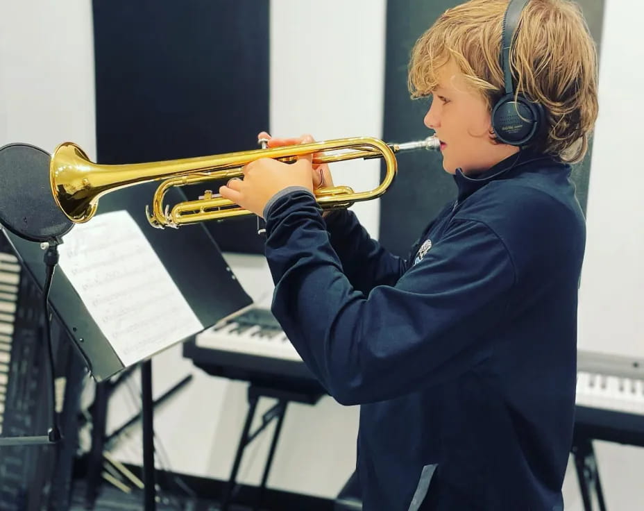 a person playing a trumpet