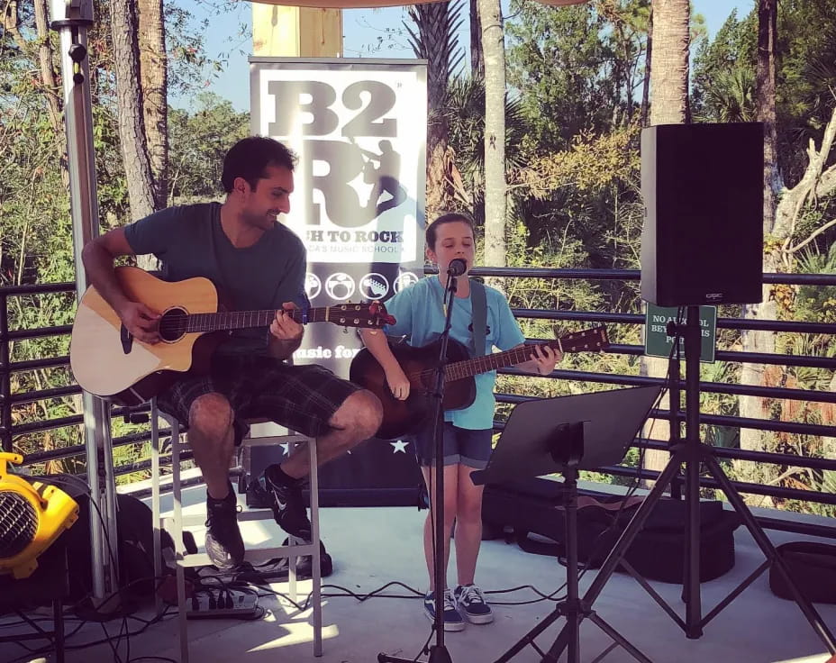 a couple of men playing instruments