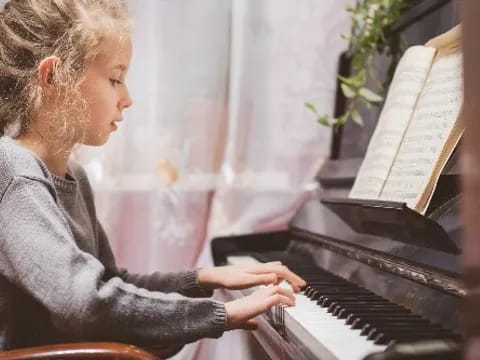 a person playing a piano