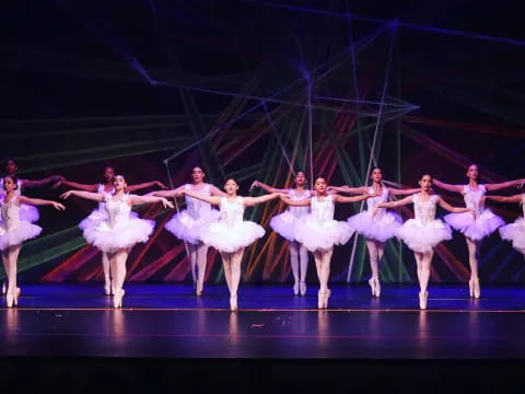 a group of women dancing on a stage