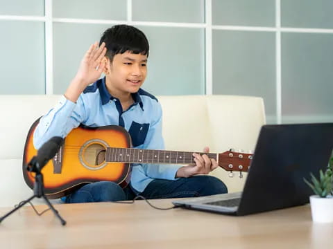 a person playing guitar