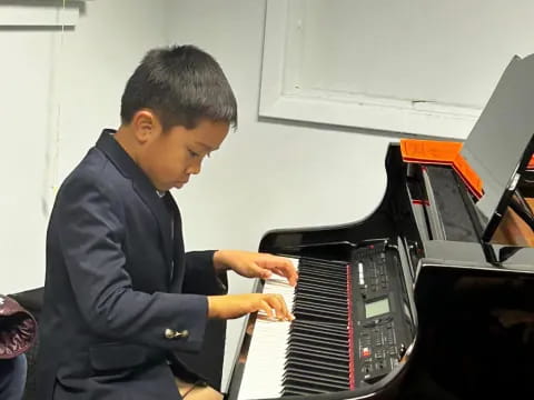 a person playing a piano