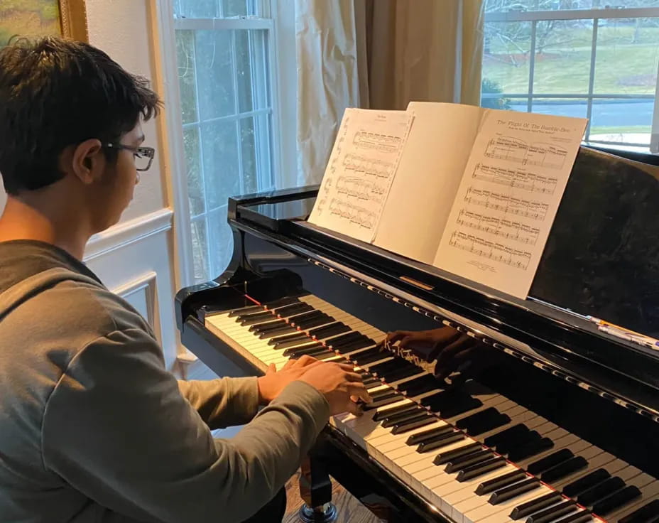 a person playing a piano