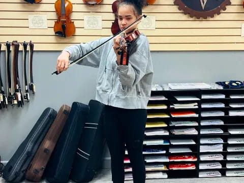 a person playing a violin