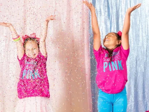 a couple of girls in a room