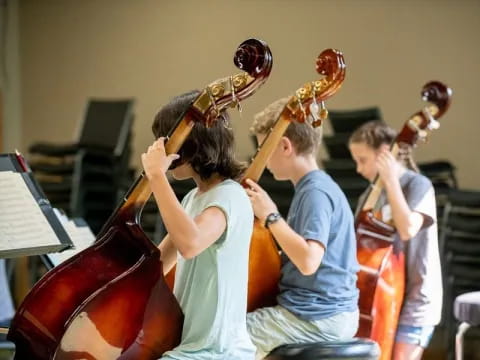 a group of people playing instruments