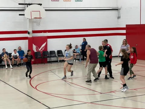 a group of people in a gym