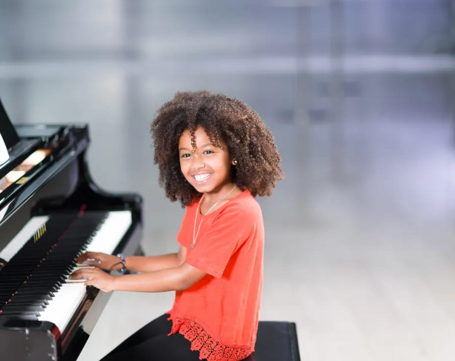 a man playing a piano