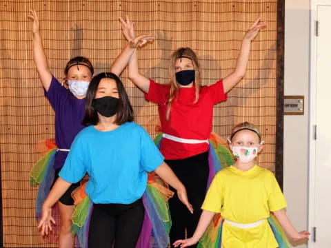 a group of people wearing masks