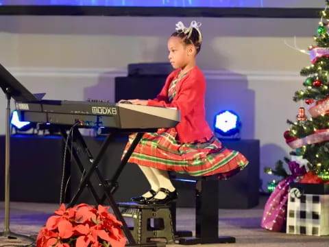 a girl playing a piano