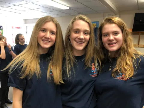a group of girls smiling