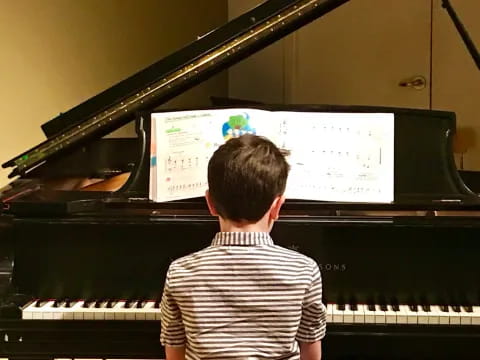 a person playing a piano