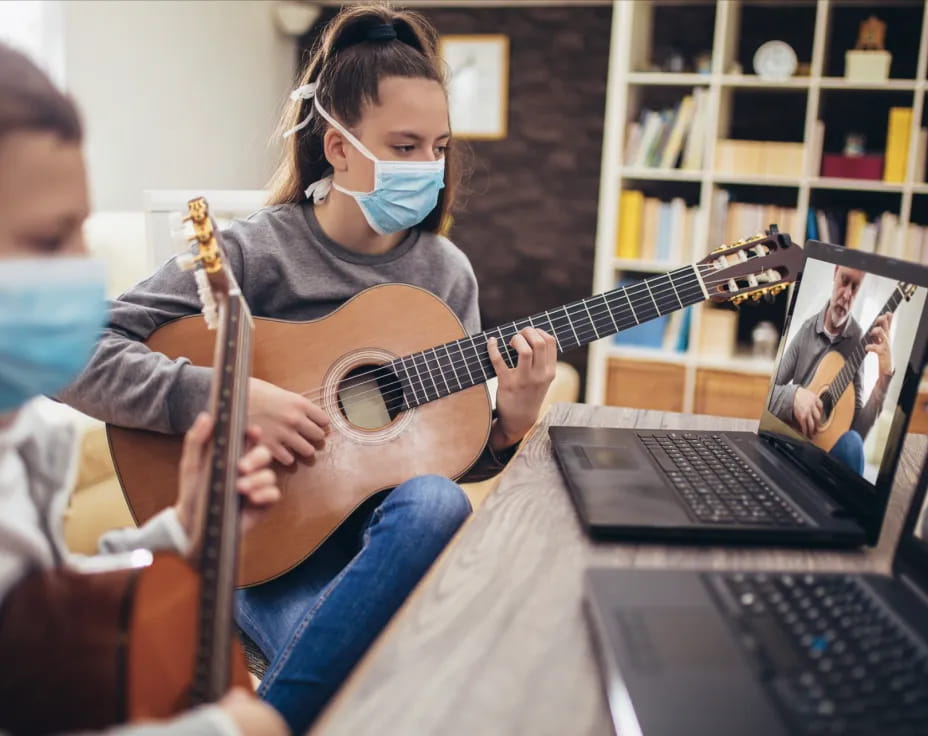 a person playing a guitar