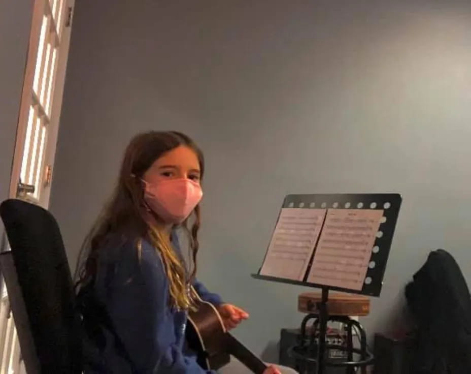 a woman holding a board