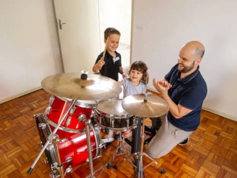 a group of people playing drums