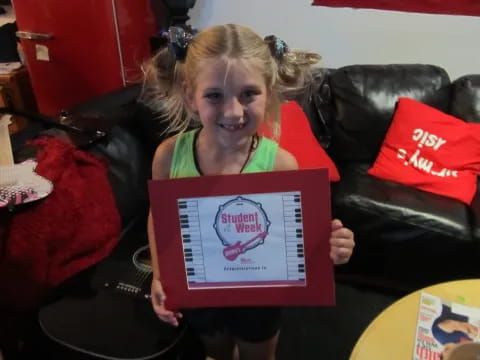 a girl holding a book