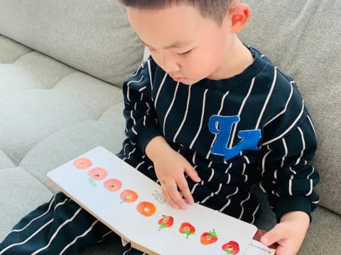 a baby reading a book