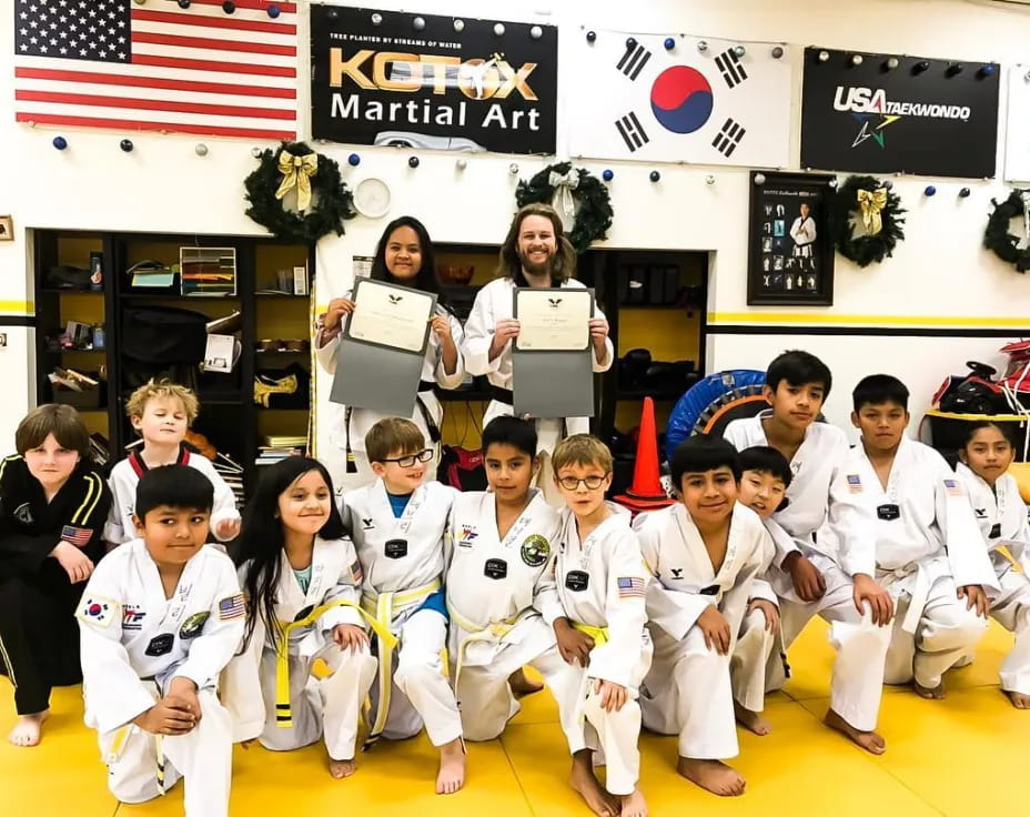 a group of people in white uniforms