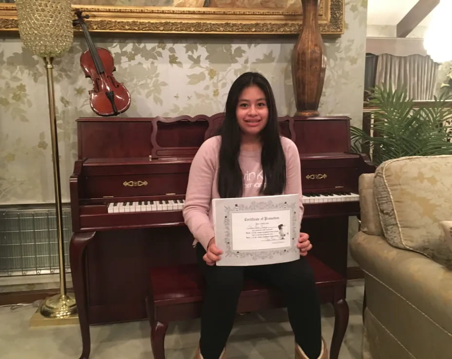 a woman holding a sign