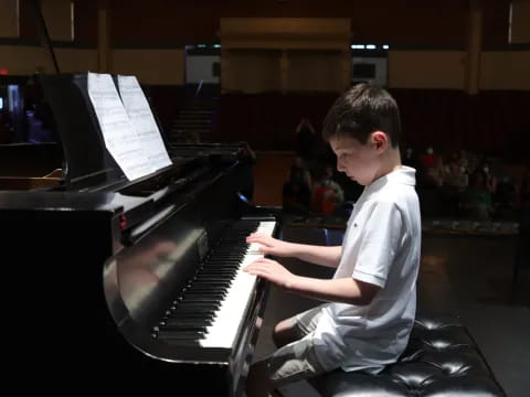 a man playing a piano