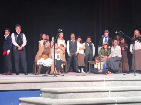 a group of people on stage