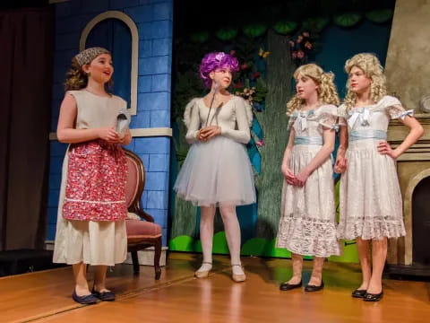 a group of girls on a stage