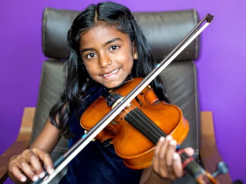 a person playing a violin
