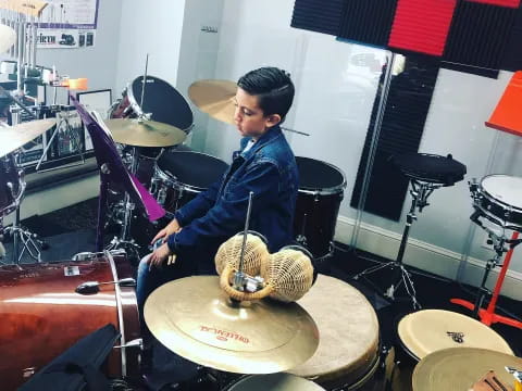 a person playing drums