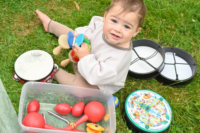 a baby playing with a toy
