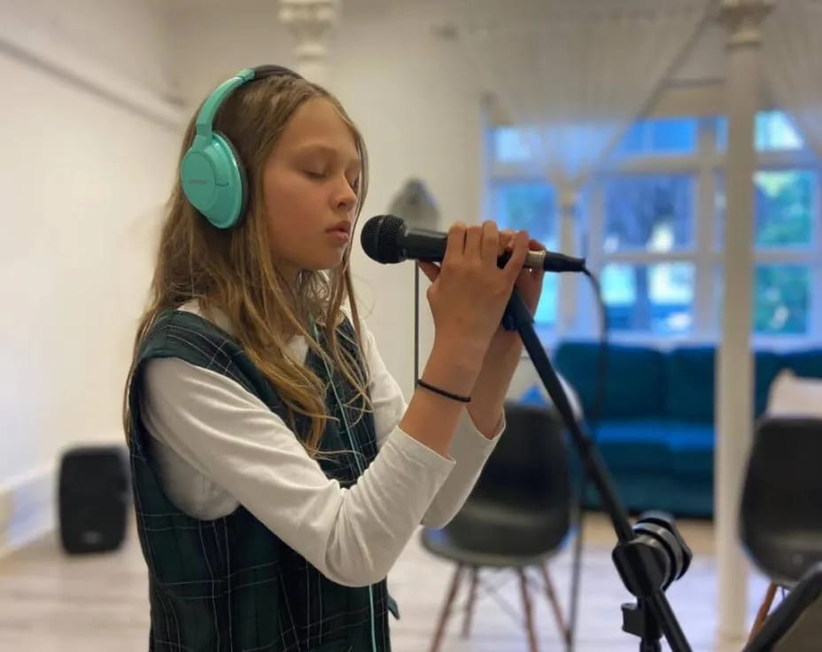 a woman with a microphone