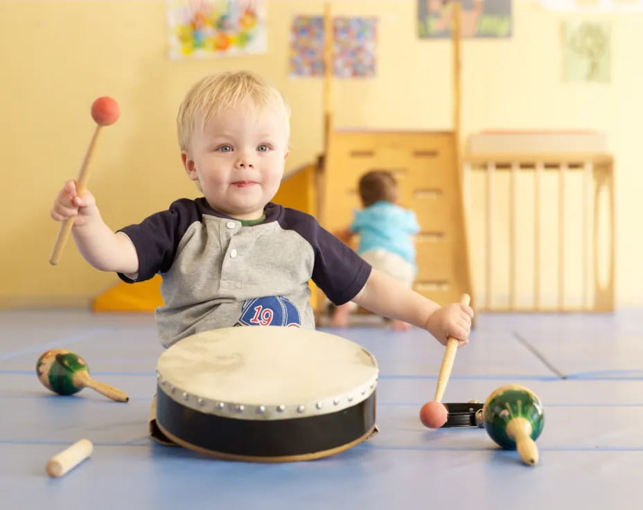 a boy playing with toys