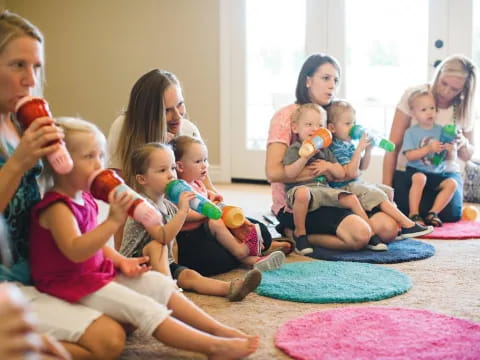 a group of children sitting on the floor