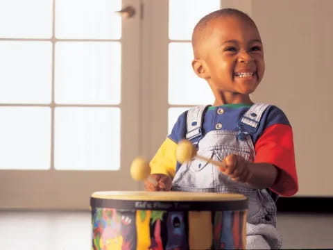 a child holding a toy