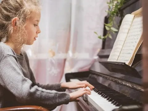 a person playing a piano