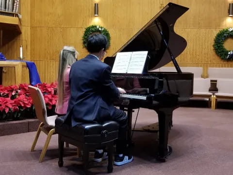 a person playing a piano