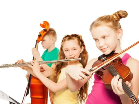 a group of kids playing violin